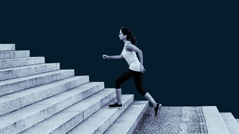 Woman climbing steps