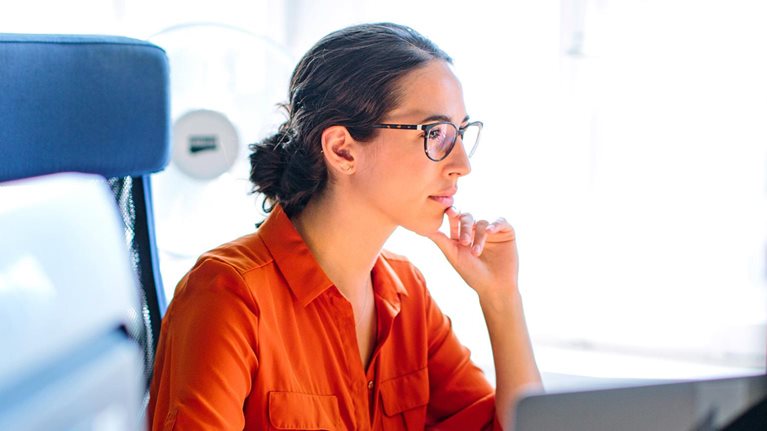 Business woman working at her desk