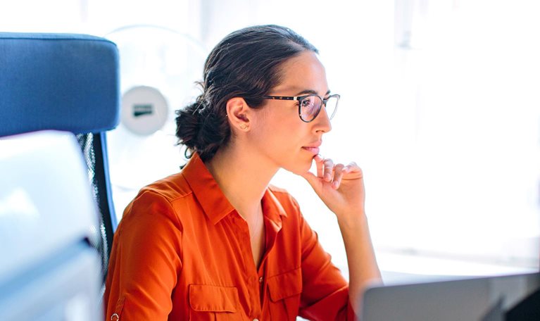 Business woman working at her desk