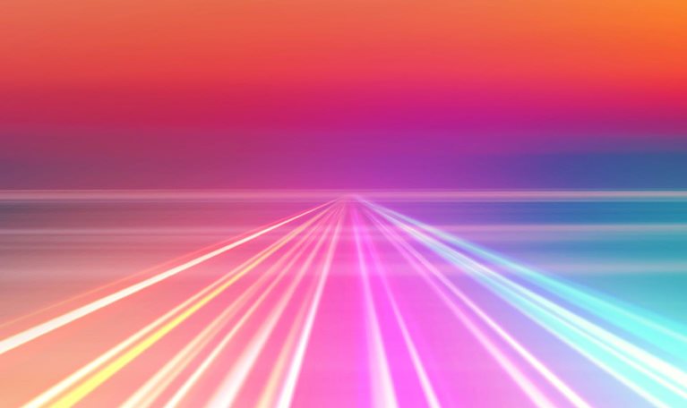 Abstract picture of colorful light trails crossing twilight sky with fast motion.