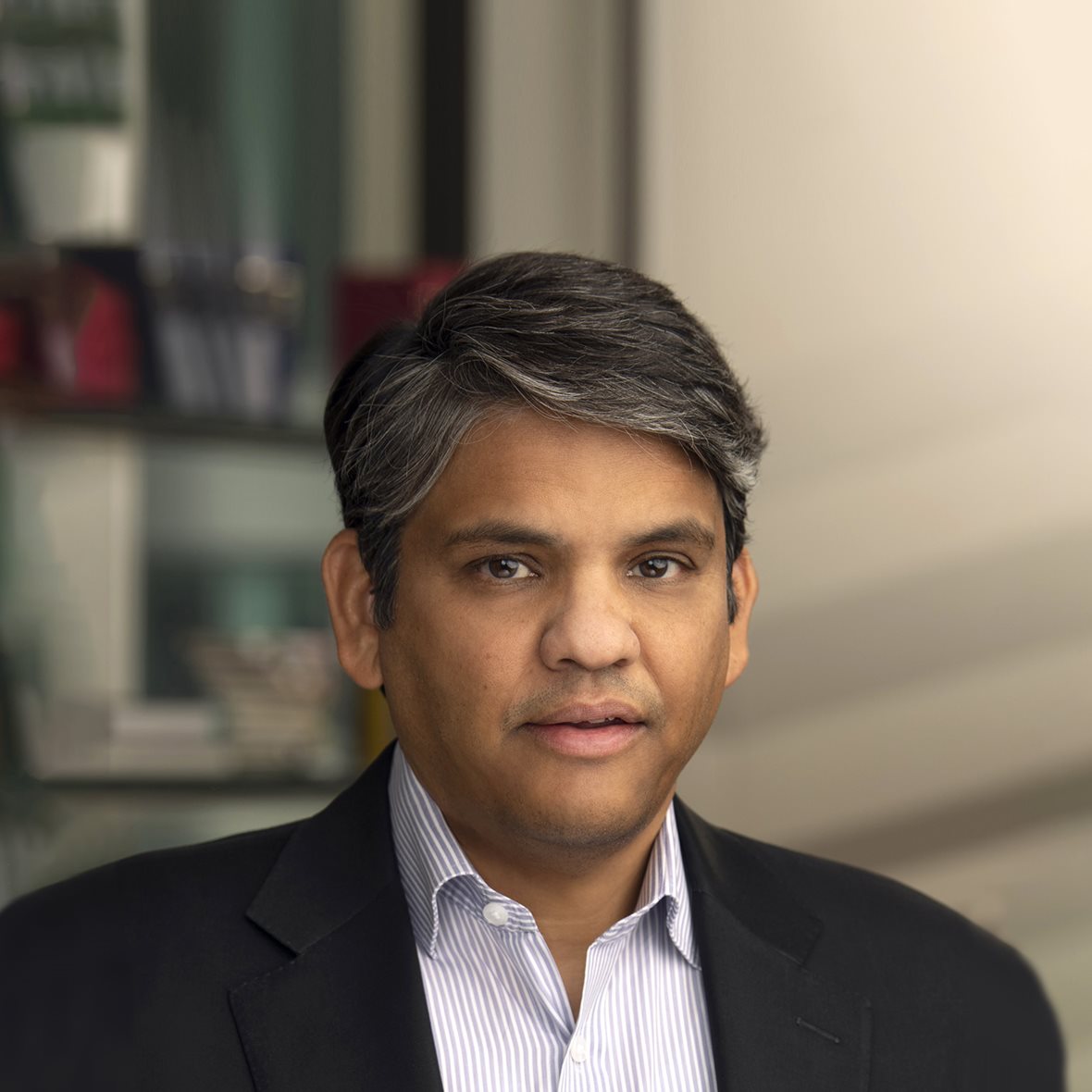Headshot of Frank D’Souza.
