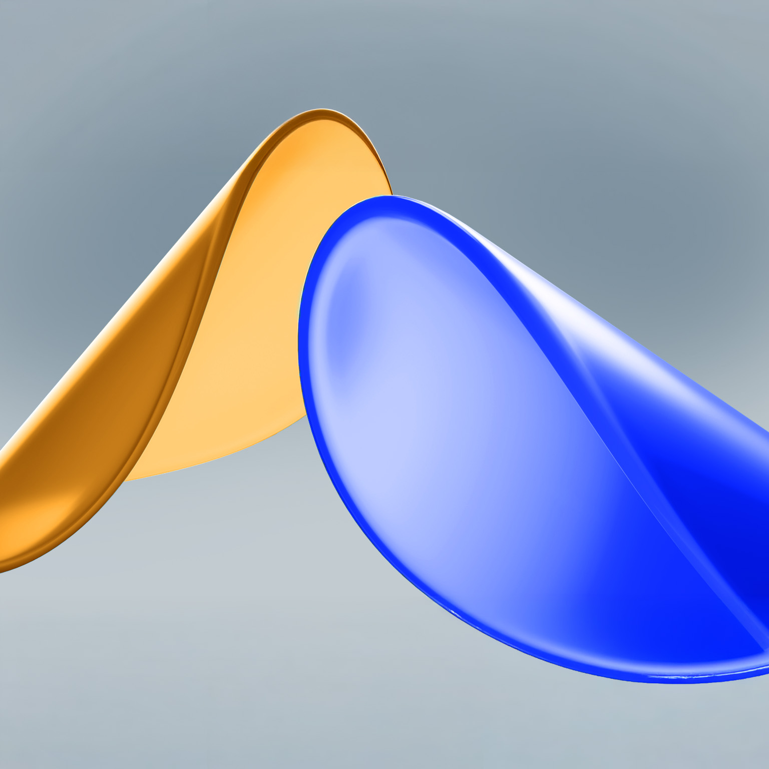 Two smooth, glossy disk-like shapes set against a soft gray background: one golden and the other blue. The lighting and reflective surfaces give the composition a sleek appearance.