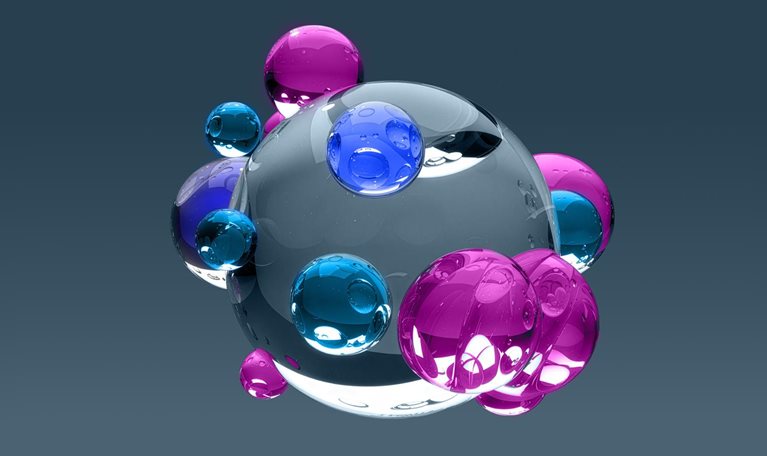 A cluster of glossy, translucent spheres in blue, purple, and clear tones surrounds a larger central orb.