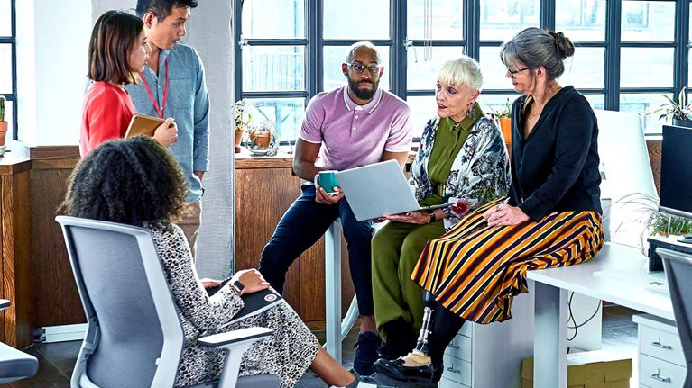 Diverse group of business colleagues having informal meeting