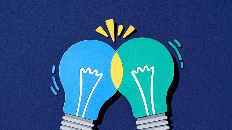 Paper-cut illustration of two lightbulbs intersecting