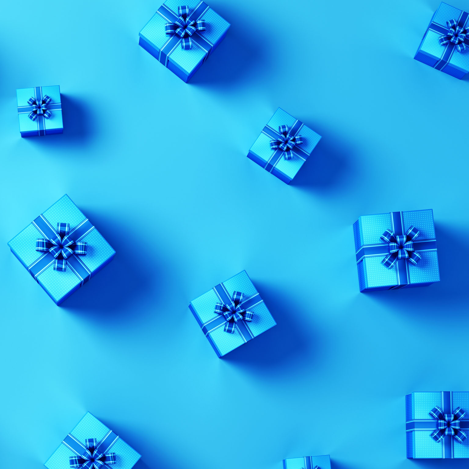 An image of blue gift boxes with blue ribbons.