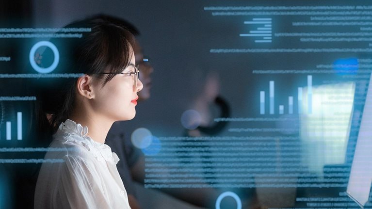 Woman uses pc computer with technology of virtual visual screen - stock photo