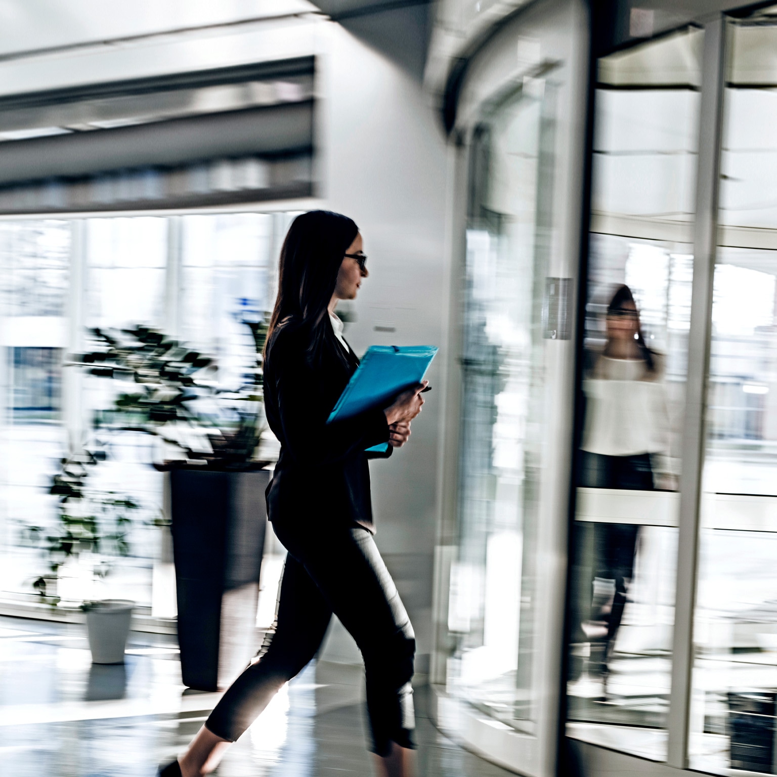 Businesswoman walking in lobby