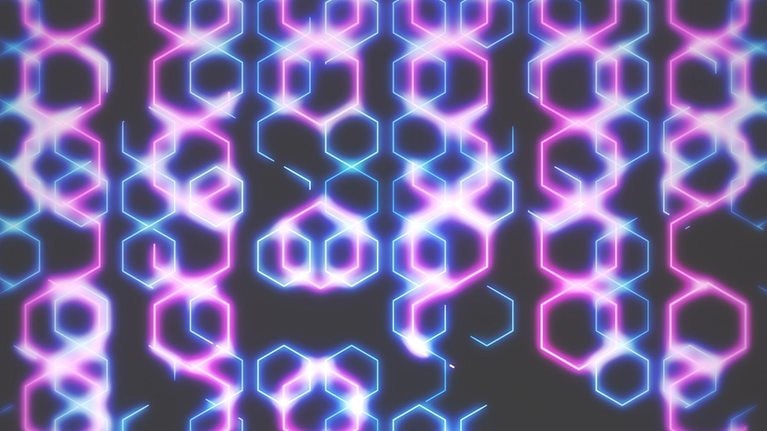 Video of colorful hexagons overlapping with shifting light.