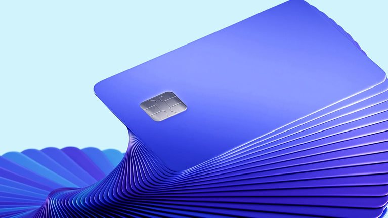 An abstract image of a stack of 3D credit cards swirling up in a repeating twisting pattern.