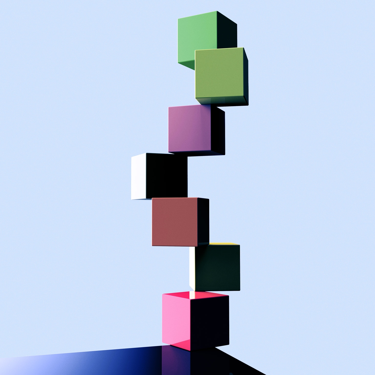 A set of colorful cubes arranged in a precarious stack, teetering on the edge of a surface.