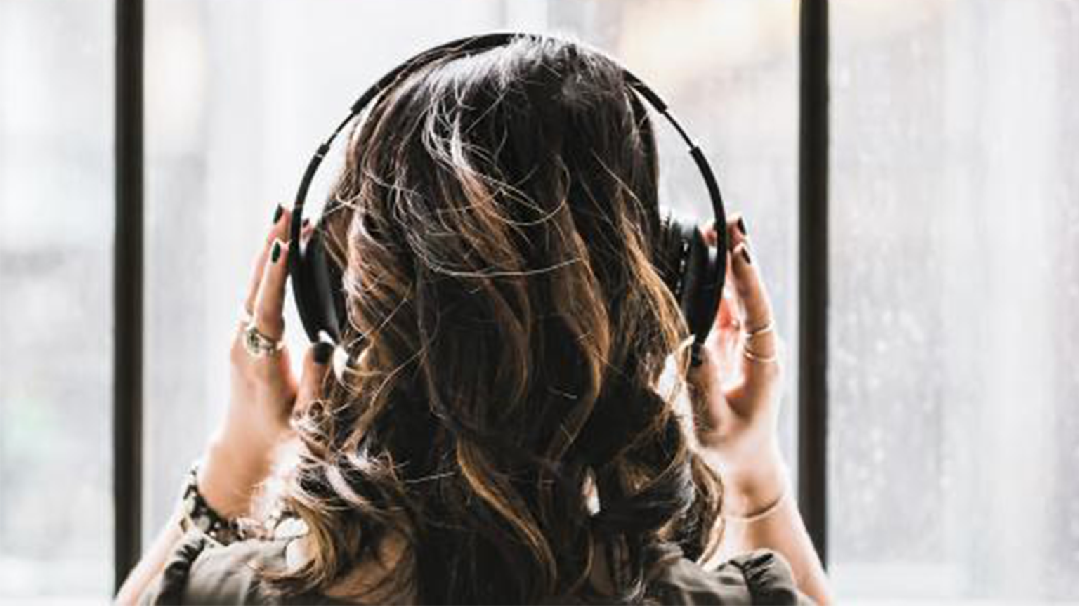 Woman putting on a headset