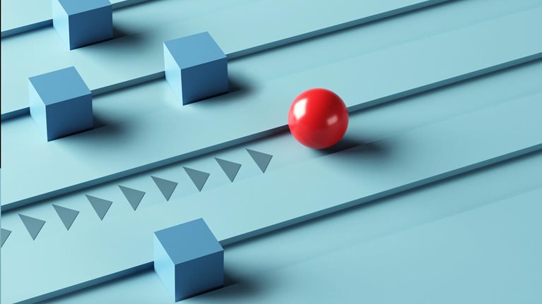 A red sphere is in the lead, followed by several gray squares, each positioned in its own groove.