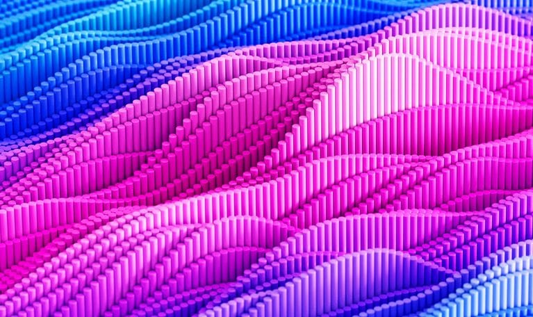 A vibrant field of small cylindrical pillars forms undulating, graph-like patterns across the surface. The colors transition smoothly from blue to pink, creating a dynamic and abstract visual effect.