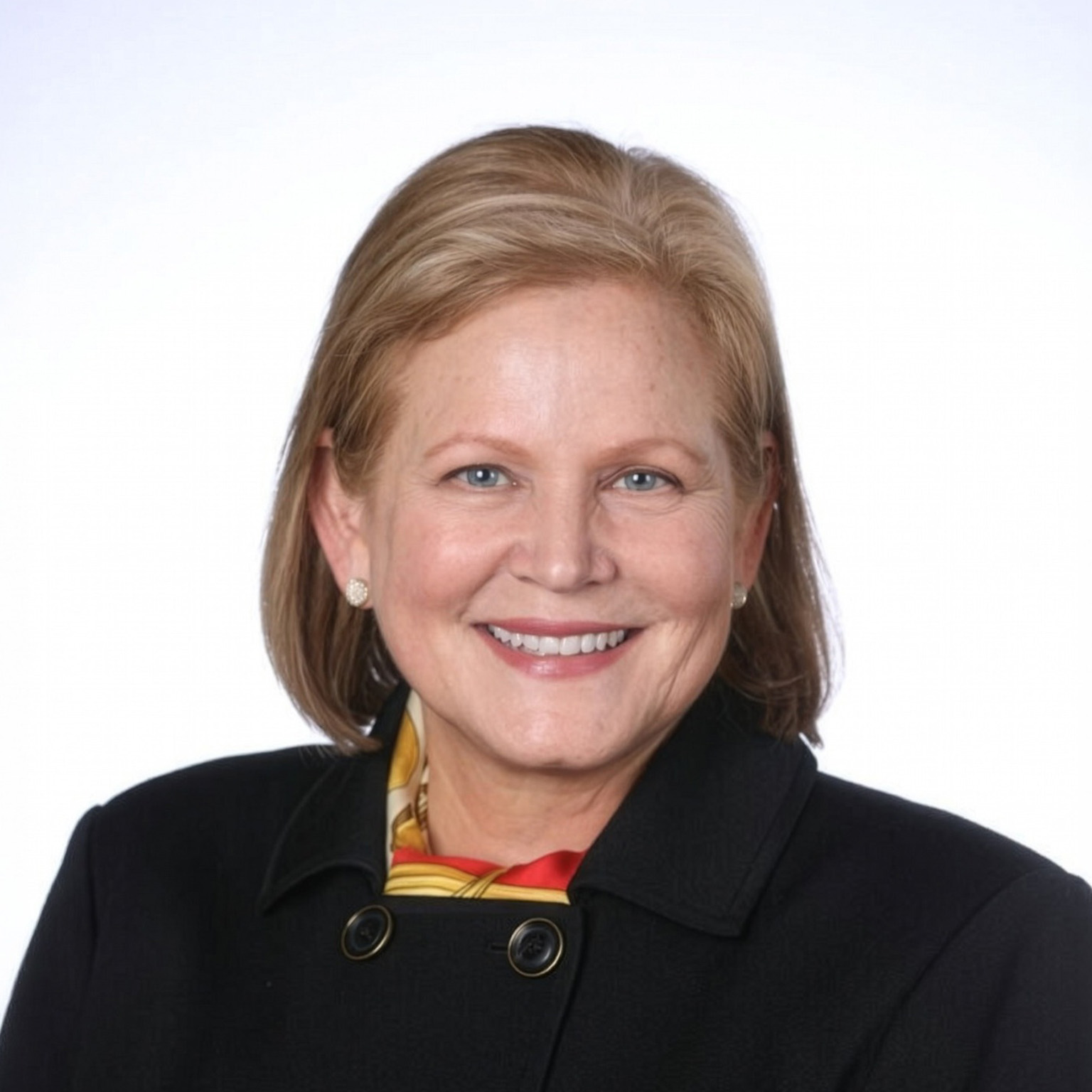 Portrait of Christiana Smith-Shi, who sits on the boards of Columbia Sportswear and UPS and is Chair of Habitat for Humanity International.