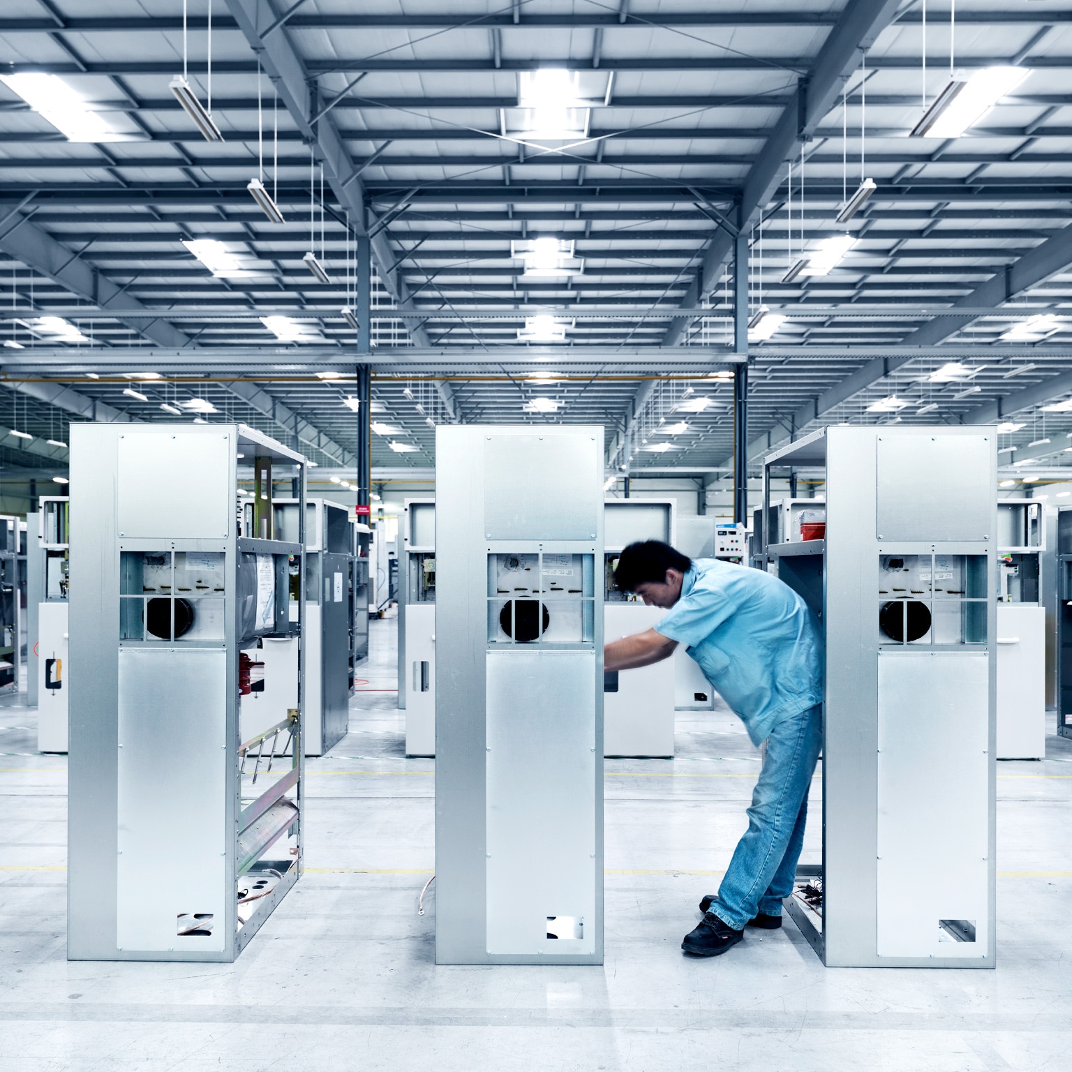 A factory employee doing product inspection