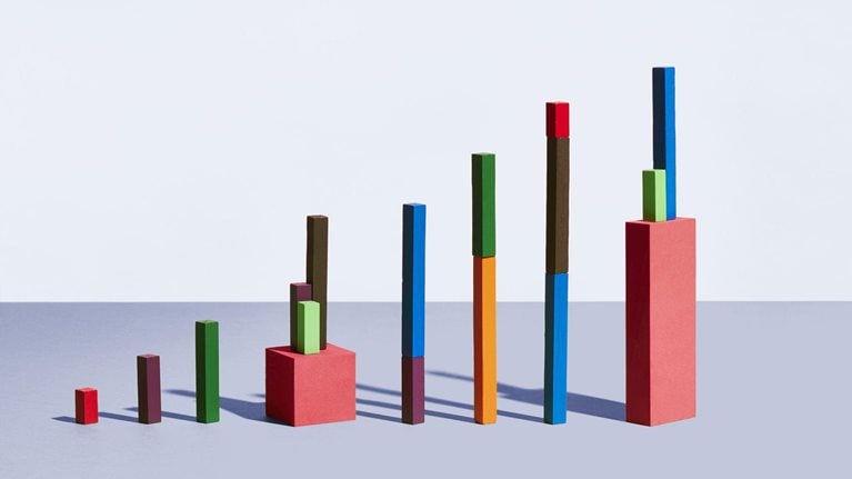 Conceptual image of colorful geometric blocks arranged as a graph.