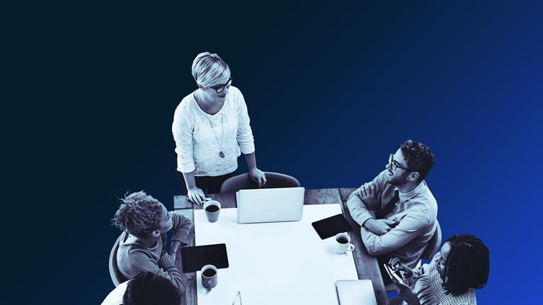 A group of young businesspeople having a meeting in a modern office