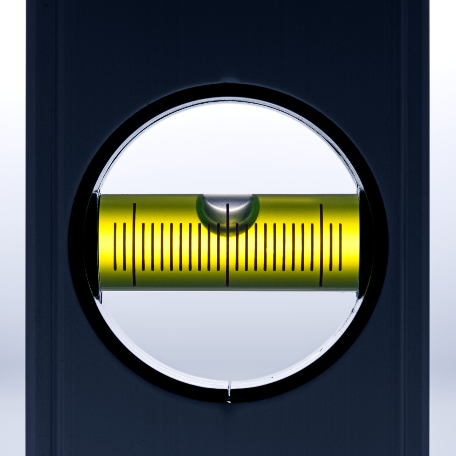 Back-lit spirit level close-up view against white background