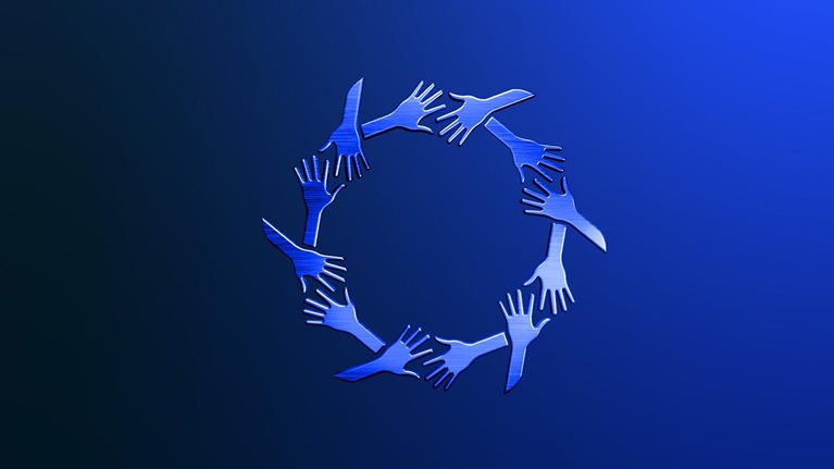 A ring made out of metallic blue hands. The hands are organized in pairs that are reaching towards one another reminiscent of a handshake gesture.