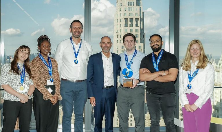 Innovation Olympics winning team, with Iris Roelens, John Law-Lund, and Suryansh Soni