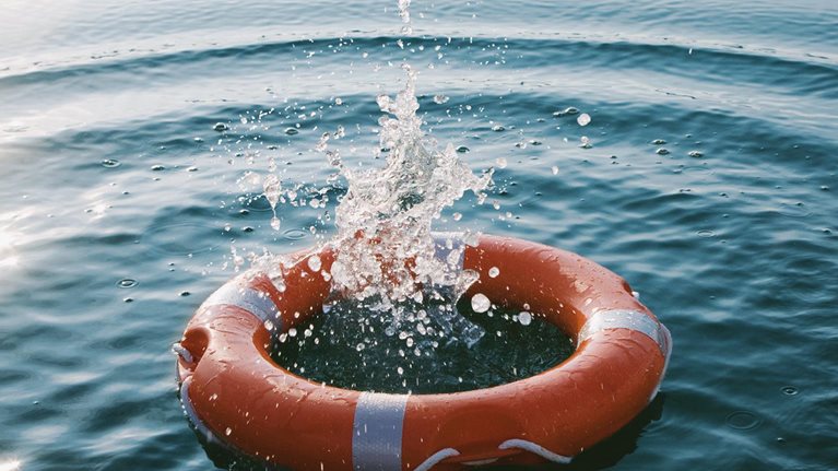 Life raft splashing in water