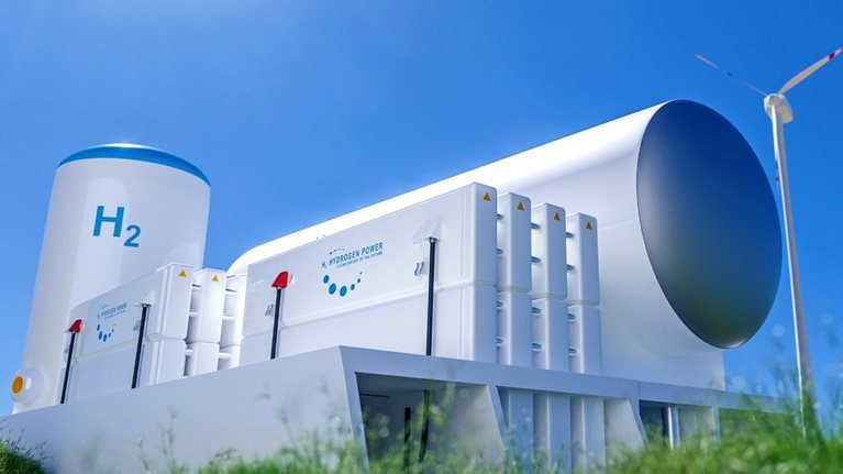 3D rendering of hydrogen energy tanks in a green field with wind turbines behind it