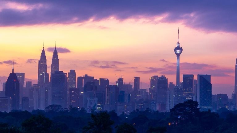 Time lapse of moving clouds over downtown Kuala Lumpur, Malaysia.