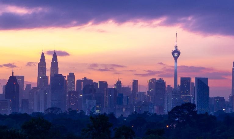 Time lapse of moving clouds over downtown Kuala Lumpur, Malaysia.