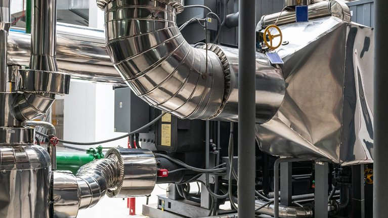 Lithium bromide absorption heat pump in power plant - stock photo