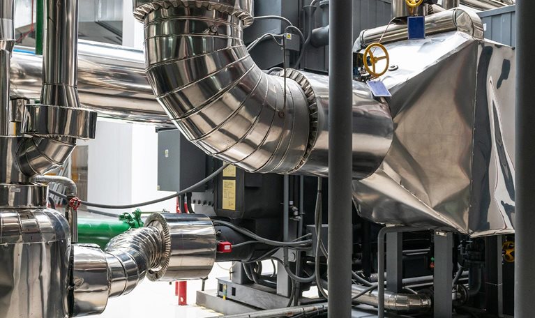 Lithium bromide absorption heat pump in power plant - stock photo