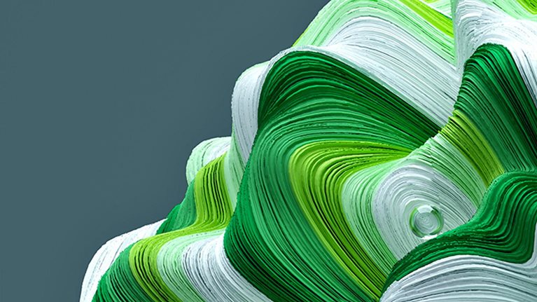 A green and white striped wave ripples up from the lower right hand corner