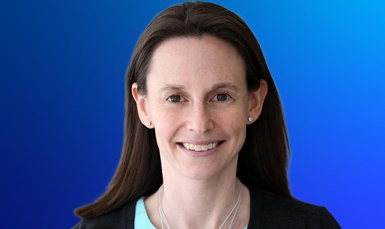 Smiling portrait of McKinsey Partner, Julie Goran