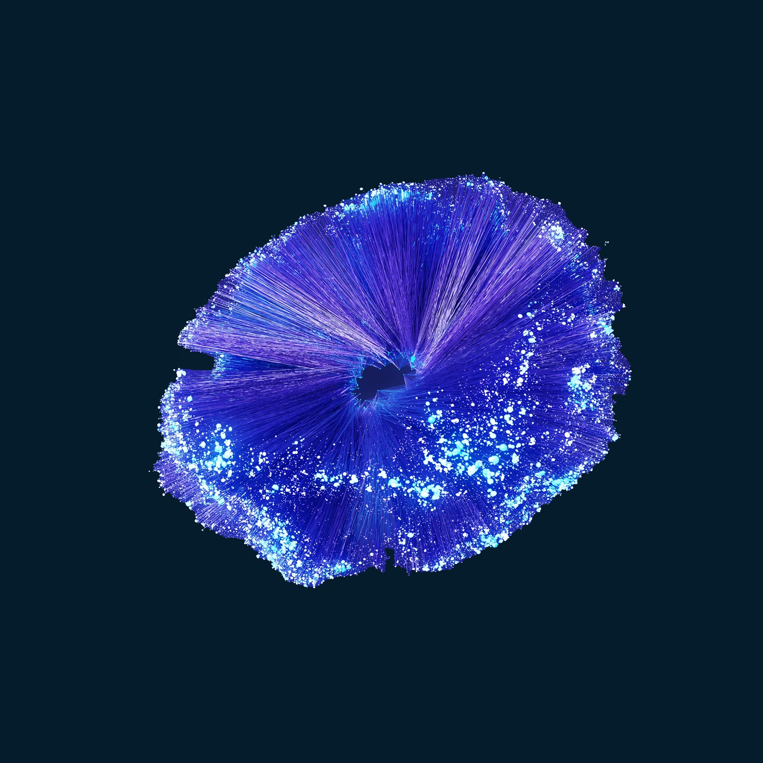 A vibrant, abstract burst of fine purple and blue lines radiating outward from a dark central opening, resembling an energetic digital explosion or data visualization.