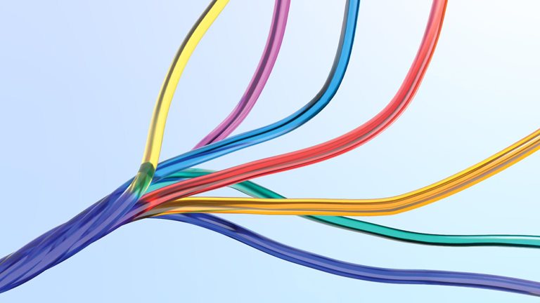 Colorful, translucent wire like strands curve and intertwine across a pale blue background.