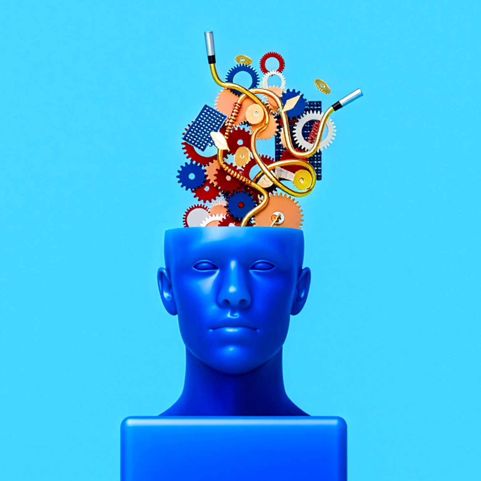 3D illustration of a bright blue human head with its top open, revealing a cluster of colorful interlocking gears, springs, and curved metallic tubes