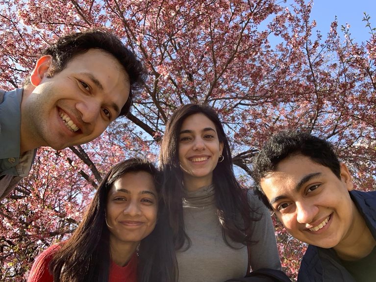 Meghna with friends and cherry blossom trees