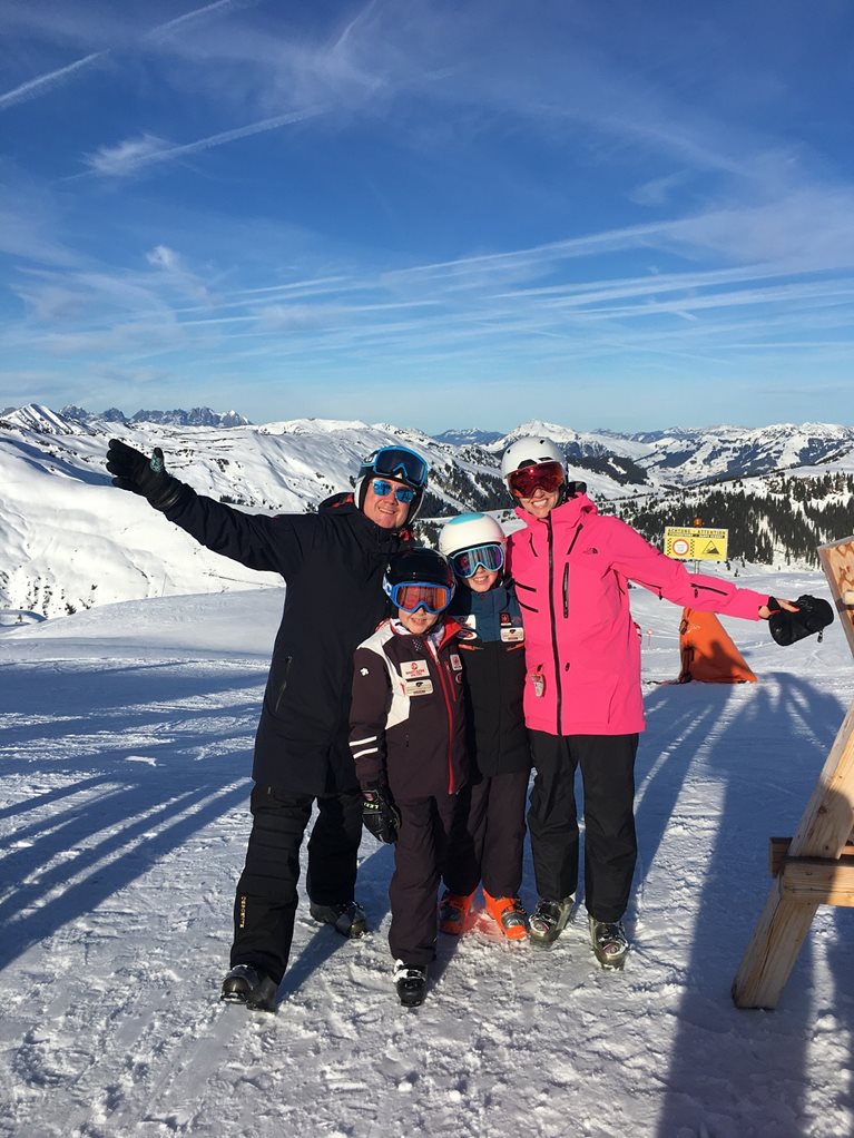 Rebecca skiing with husband and daughters