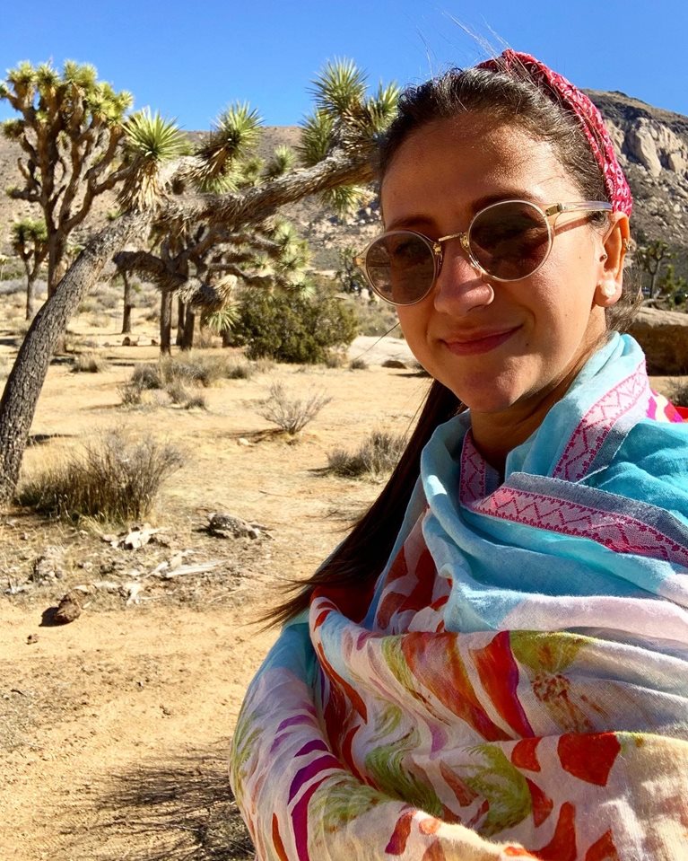Suzane in a colorful pashmina in desert 