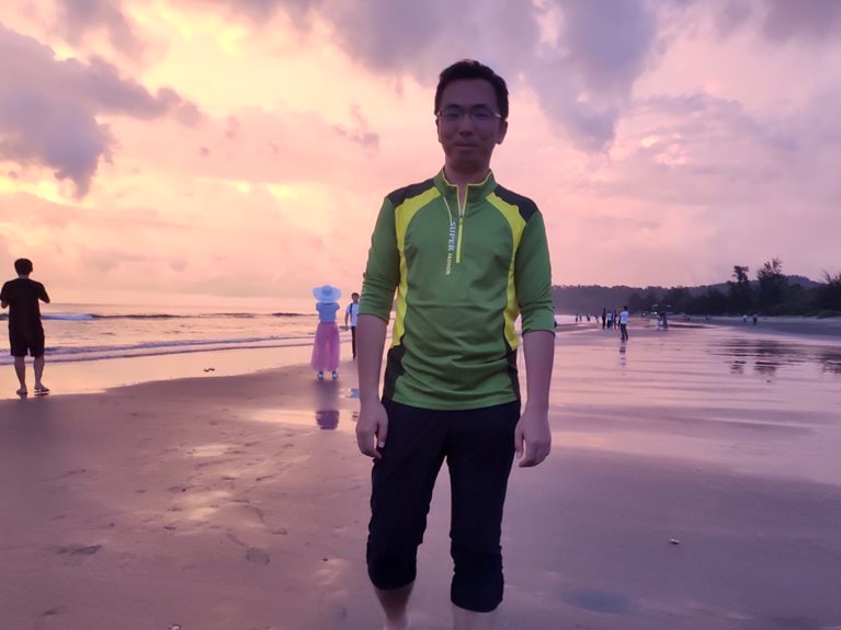 Xulei on beach at sunset