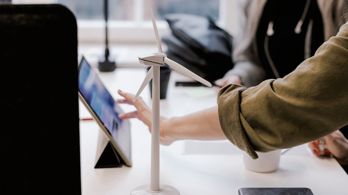 Image of a person touching a tablet