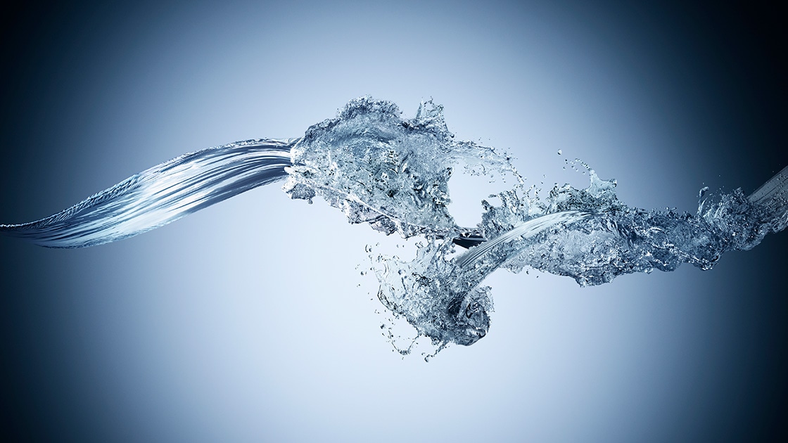 Image of two water streams colliding in midair