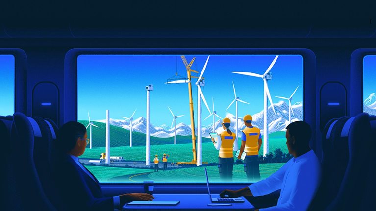 Two business people looking out the window of a train. In the window, a team of people is building a wind farm.