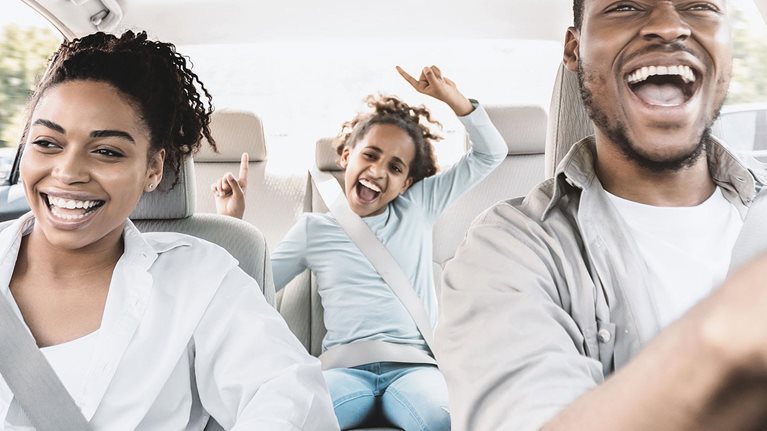 Happy Black Family Of Three Singing Having Fun Riding Car