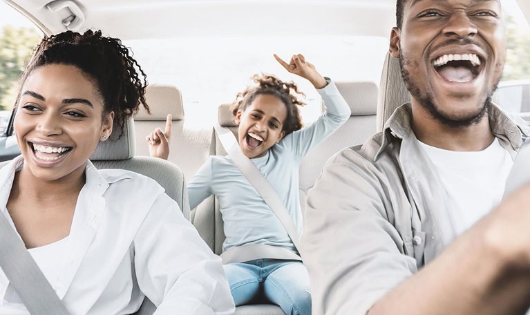 Happy Black Family Of Three Singing Having Fun Riding Car