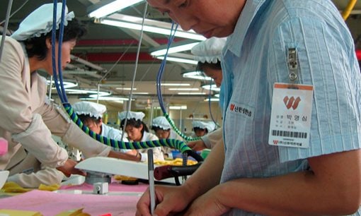 North Korean workers turn out apparel at a South Korean factory in the inter-Korean industrial park in Kaesong, North Korea, just a few hundred meters north of the demilitarized zone.