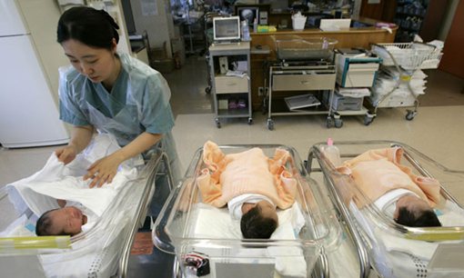 A nurse looks after newborn babies at the Samsung Medical Center, a subsidiary of the Samsung Group.