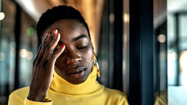 Young Black women looking stressed