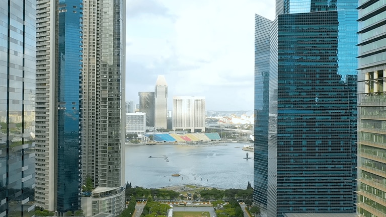 Aerial view looking between buildings in Singapore. - stock phot