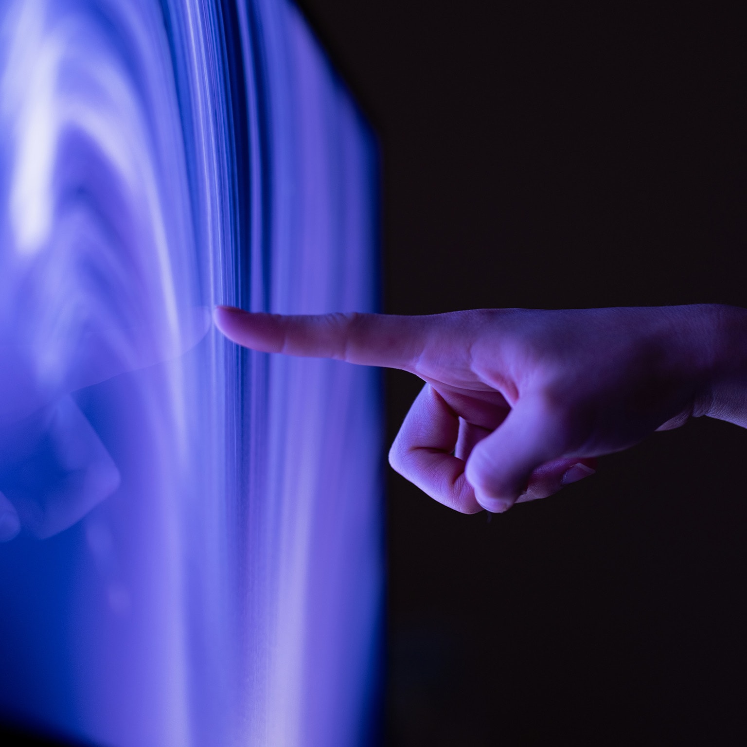 Connect to the future, Close-up of extended finger clicking computer screen